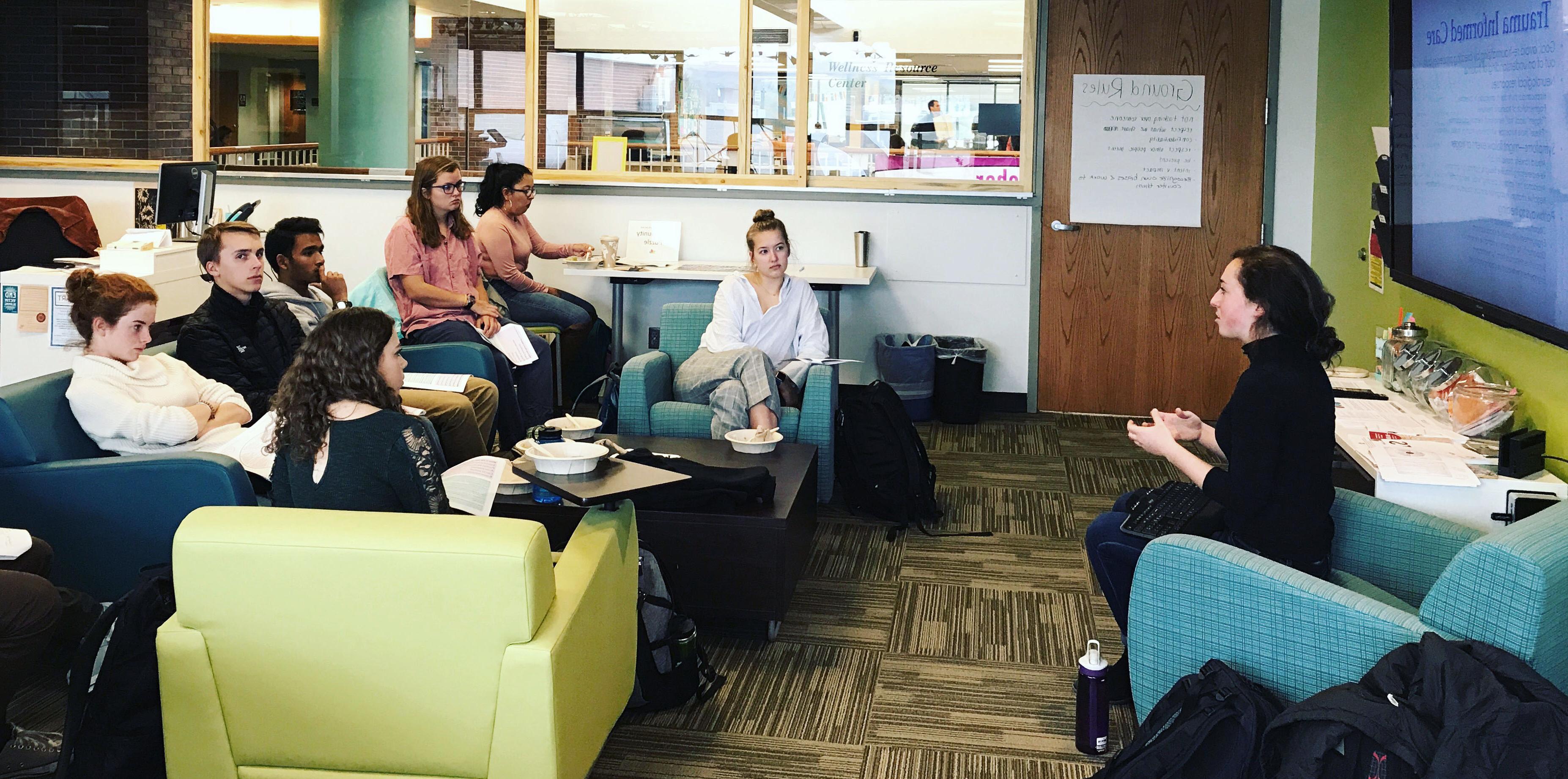 Paraprof Montana Bass '18 leads students in a workshop on providing trauma informed care for survivors of gender-based violence.